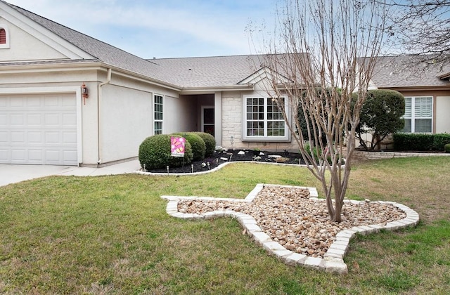 ranch-style house featuring a garage and a front yard