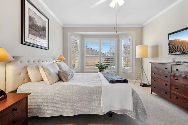 bedroom with crown molding, light colored carpet, and ceiling fan