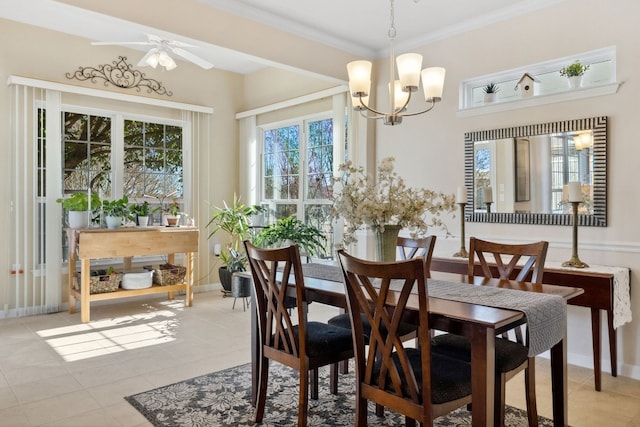 dining space featuring ornamental molding, ceiling fan with notable chandelier, and light tile patterned floors