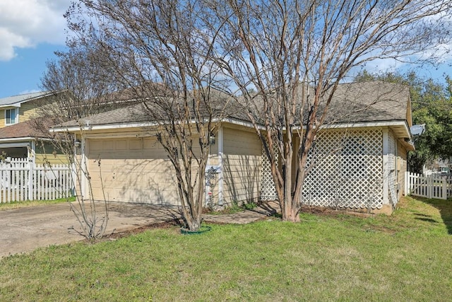 view of side of home featuring a lawn