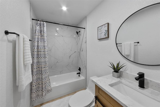 full bathroom with vanity, toilet, and shower / bath combo with shower curtain