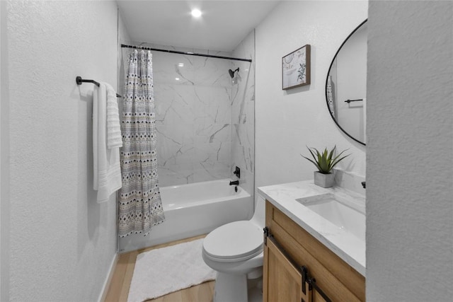 full bathroom with shower / bath combination with curtain, vanity, and toilet