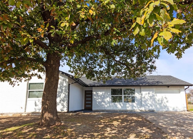 ranch-style home with a garage