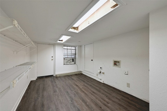 laundry room featuring hookup for a washing machine, dark hardwood / wood-style floors, cooling unit, and hookup for a gas dryer