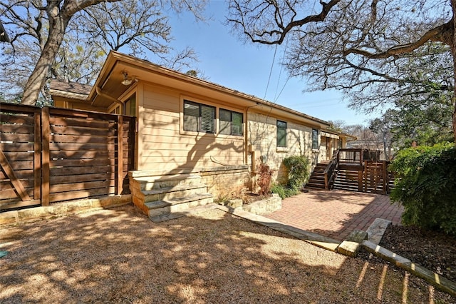 back of property featuring a patio