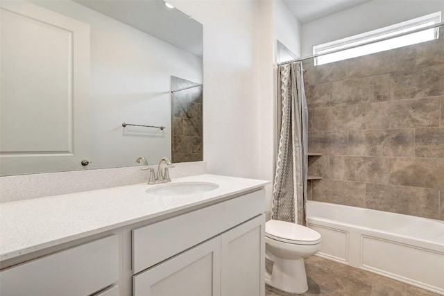 full bathroom featuring vanity, toilet, and shower / bath combo with shower curtain