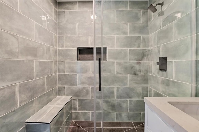 bathroom with vanity and an enclosed shower