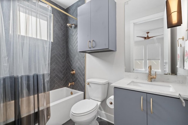 full bathroom featuring vanity, shower / bath combination with curtain, ceiling fan, and toilet