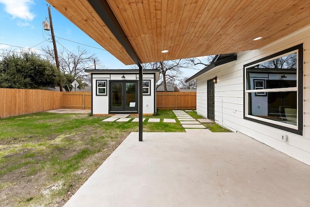 view of patio featuring an outbuilding