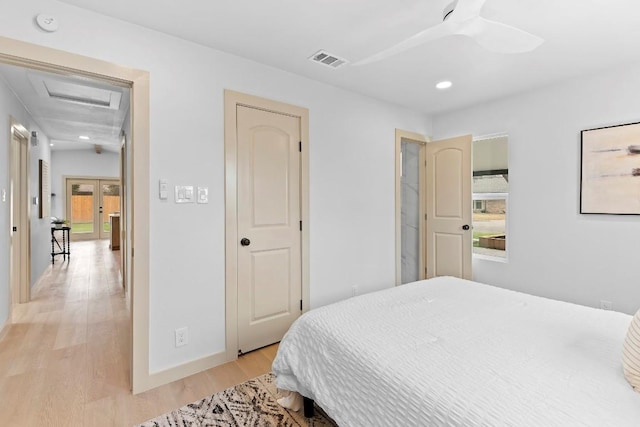 bedroom featuring light hardwood / wood-style flooring and ceiling fan