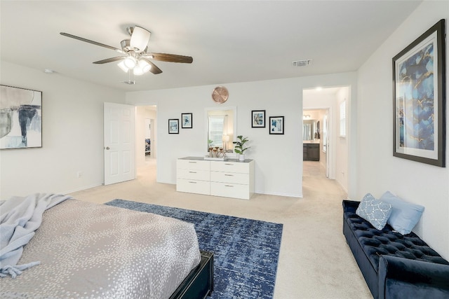 bedroom with light colored carpet and ceiling fan