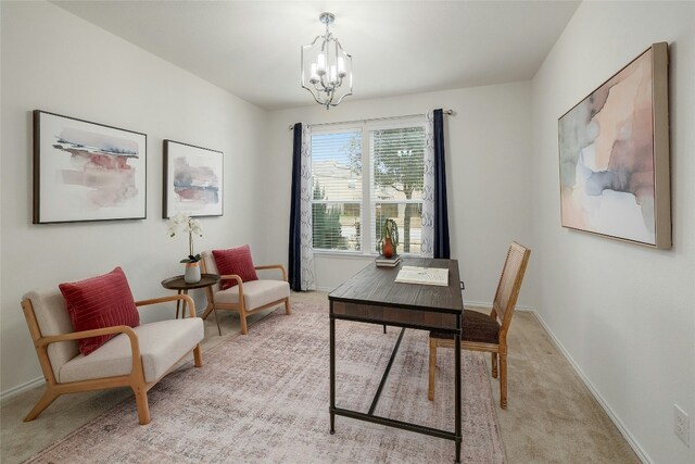 home office featuring an inviting chandelier and light colored carpet