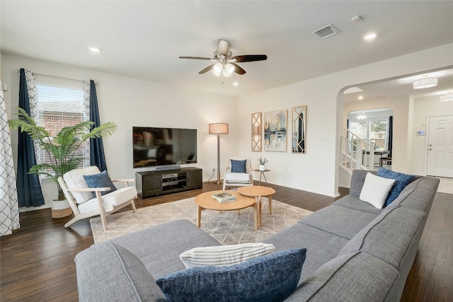 living room with hardwood / wood-style flooring and a wealth of natural light