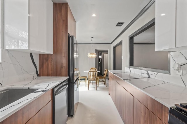 kitchen featuring dishwasher, light stone counters, a notable chandelier, white cabinets, and decorative backsplash