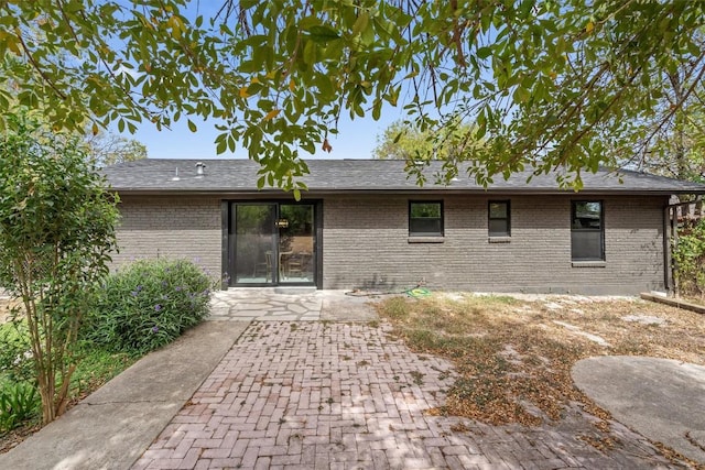 rear view of house featuring a patio area