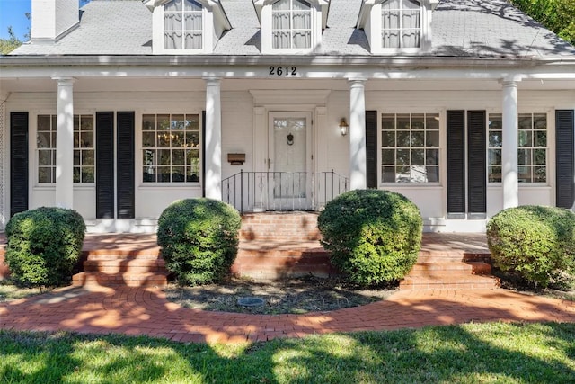 property entrance with a porch