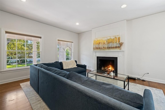 2612 Bridle Path, Austin, TX 78703 - living room with a warm lit fireplace, healthy amount of natural light, baseboards, and recessed lighting