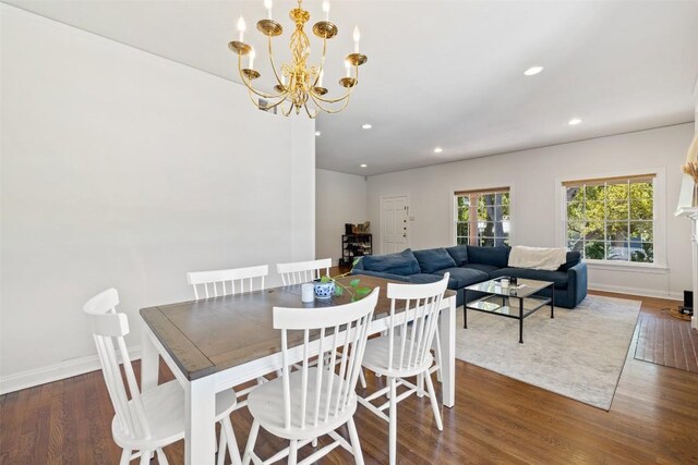 2612 Bridle Path, Austin, TX 78703 - dining room featuring wood finished floors, a chandelier, recessed lighting, and baseboards