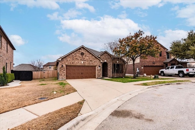 view of front of property featuring a garage