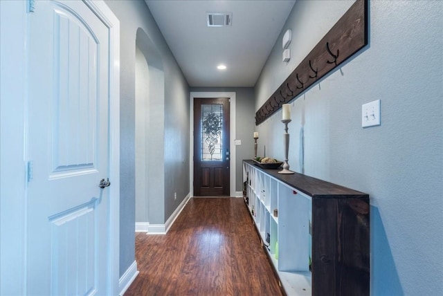 doorway featuring dark hardwood / wood-style floors