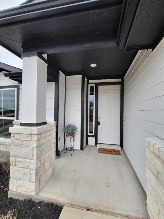 property entrance with a porch