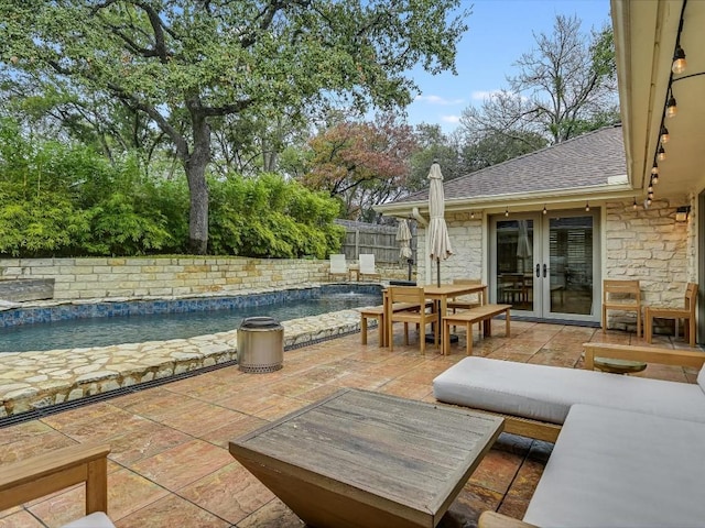 view of patio featuring french doors