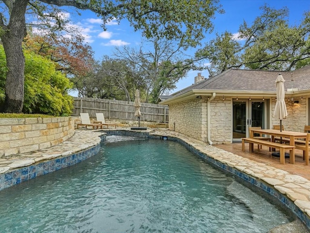 view of swimming pool with a patio