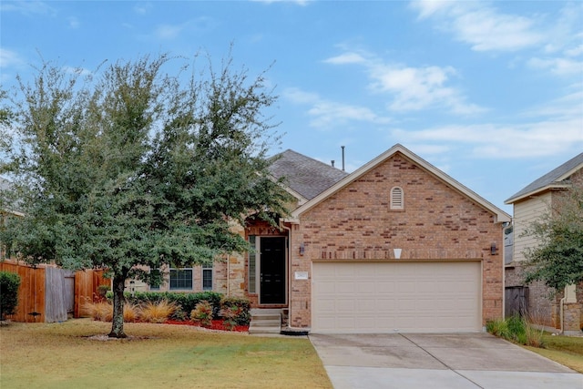 view of front facade featuring a garage and a front yard