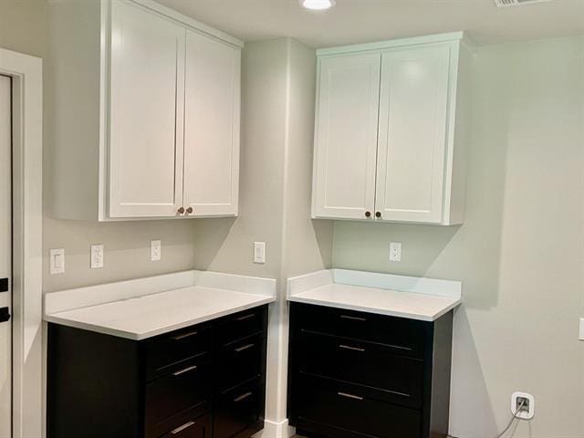 kitchen with white cabinetry