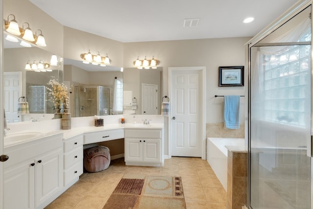 bathroom with tile patterned flooring, vanity, plenty of natural light, and independent shower and bath