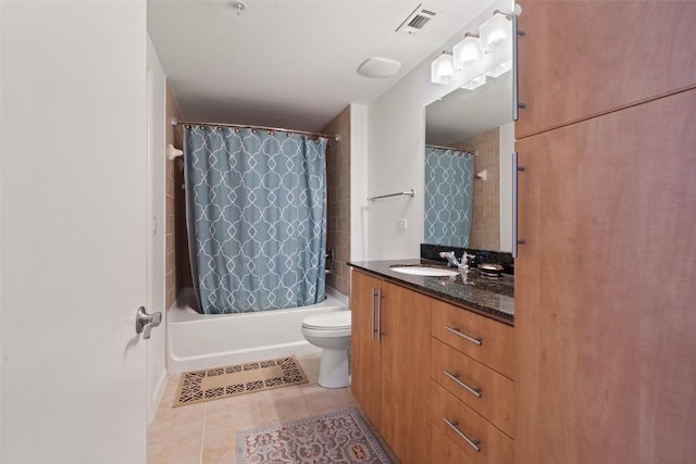 full bathroom featuring toilet, vanity, shower / bathtub combination with curtain, and tile patterned flooring