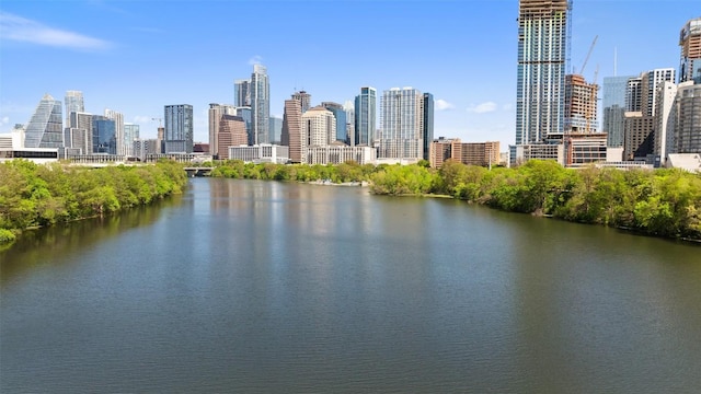 property's view of city featuring a water view