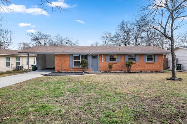 7607 Creston Ln, Austin, TX 78752 - single story home featuring brick siding, concrete driveway, a front yard, and central AC