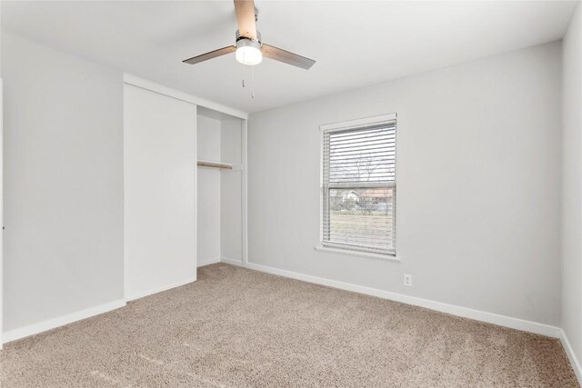 7607 Creston Ln, Austin, TX 78752 - unfurnished bedroom with carpet, a closet, and a ceiling fan