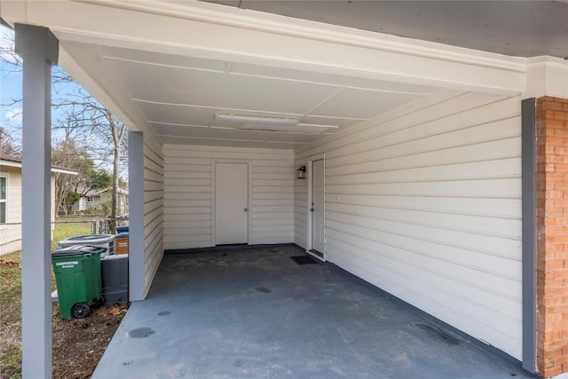 view of patio / terrace featuring a carport