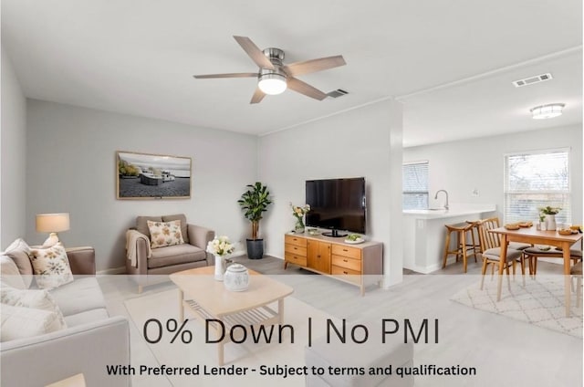 7607 Creston Ln, Austin, TX 78752 - living room featuring ceiling fan and baseboards