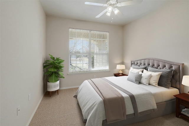 bedroom with light colored carpet and ceiling fan