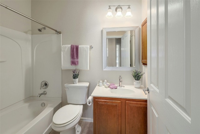 full bathroom featuring vanity, shower / tub combination, and toilet