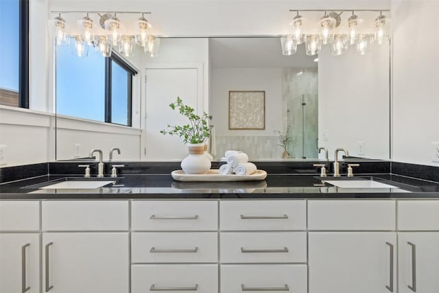 bathroom featuring vanity and walk in shower