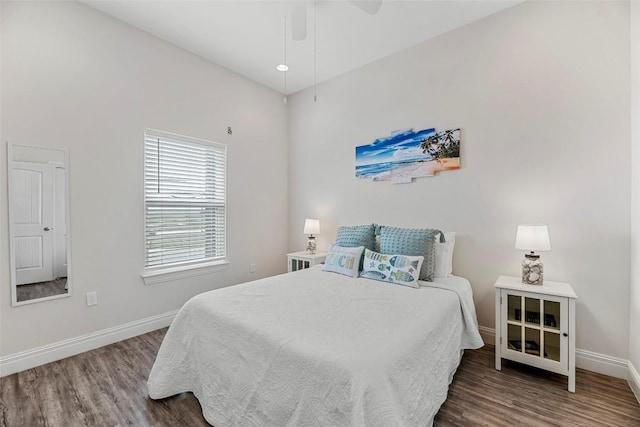 bedroom with wood-type flooring and ceiling fan