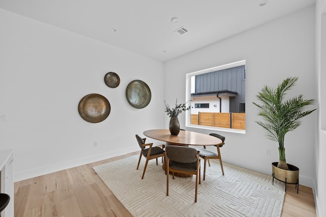 dining area with light wood-type flooring