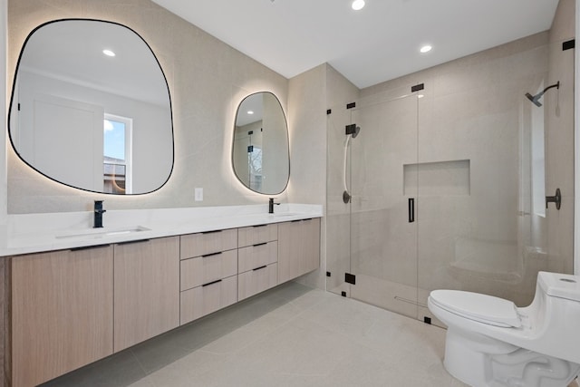 1409 Valleyridge Dr Unit B, Austin, TX 78704 - full bath featuring a stall shower, double vanity, tile patterned flooring, and recessed lighting