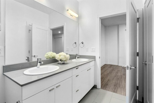 bathroom with vanity and tile patterned floors