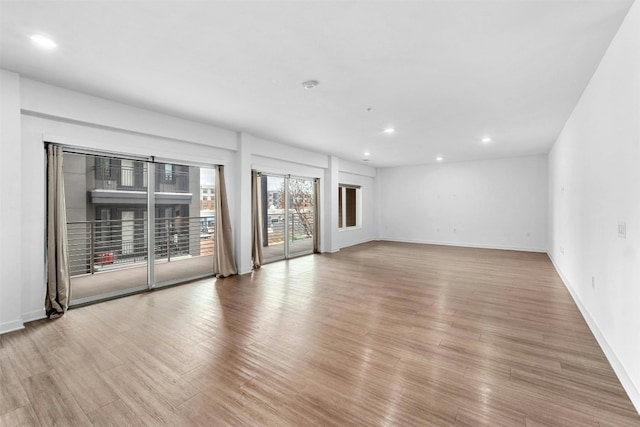 4361 S Congress Ave Unit 333, Austin, TX 78745 - unfurnished room with recessed lighting and light wood-style flooring