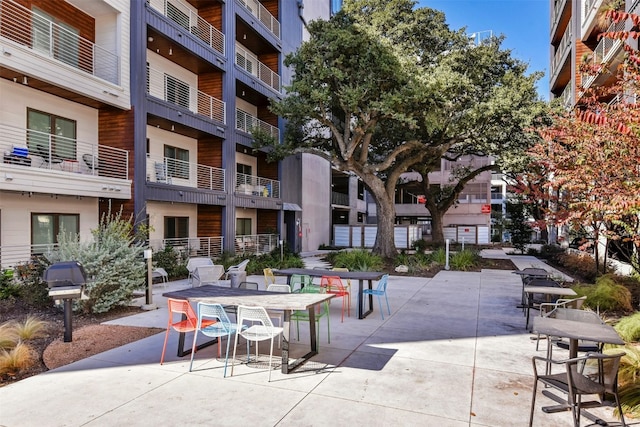 4361 S Congress Ave Unit 333, Austin, TX 78745 - view of property's community featuring a patio and outdoor dining space