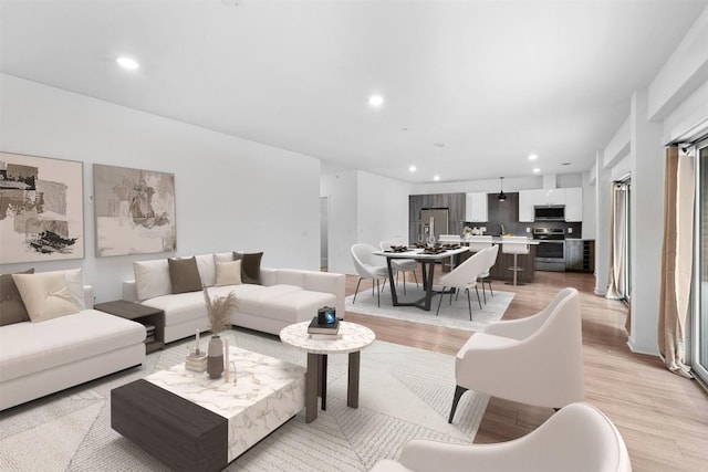 4361 S Congress Ave Unit 333, Austin, TX 78745 - living area with recessed lighting and light wood finished floors