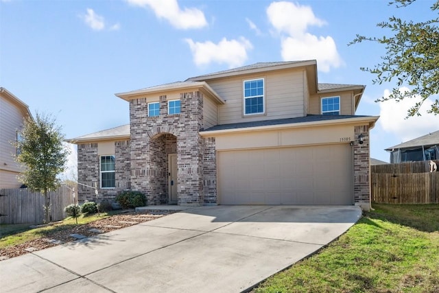 view of front of property with a garage