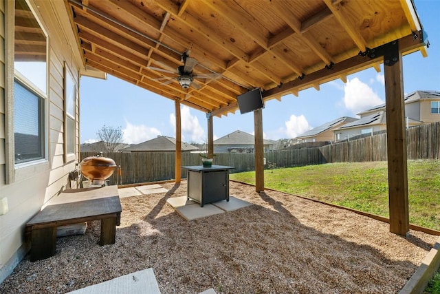 view of patio featuring ceiling fan