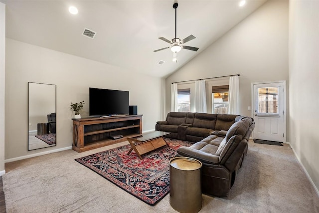 living room featuring ceiling fan, carpet, and high vaulted ceiling