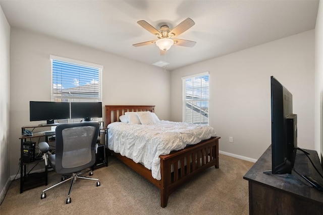 bedroom featuring light carpet and ceiling fan